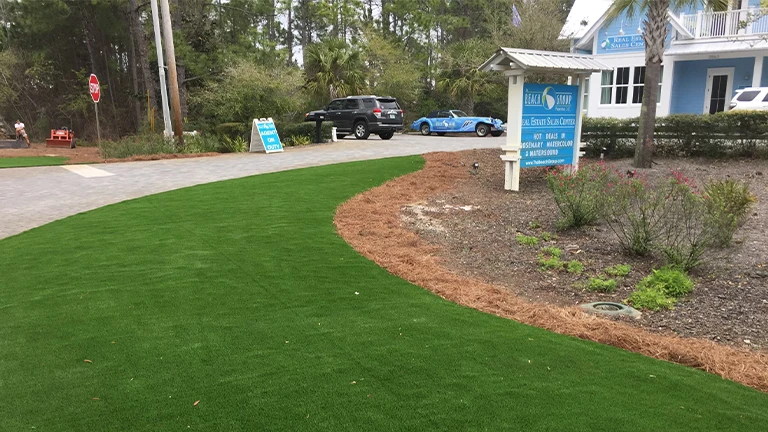 Professional synthetic grass contractor providing custom turf installation services for commercial landscapes in Atlanta, enhancing business exteriors with eco-friendly solutions.